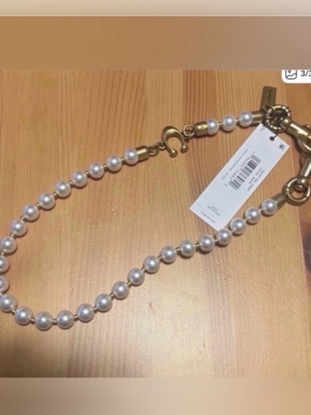 COACH Pearl Strap with Gold Hardware